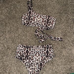 2 piece, high waisted, one strap with a tie around swimsuit! Cheetah print!
